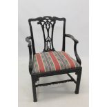 George III ebonised Chinese Chippendale-style elbow chair with relief carved pierced splat and