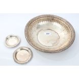 American silver dish of circular fluted form, with embossed swag and floral decoration,