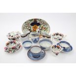 Group of early 19th century Coalport teaware - various patterns - including Imari, blue and white,