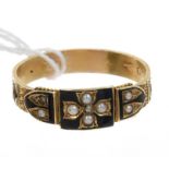 Victorian yellow metal mourning ring, the bezel with seed pearls on black enamel ground,