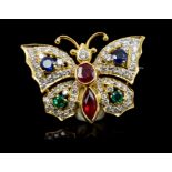Gold and multi-gem set butterfly pendant / brooch with ruby body and set with diamonds,