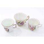 Three 18th century Chelsea Derby polychrome coffee cups with finely painted floral sprays
