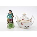 Early 19th century Staffordshire figure of a reaper by a stream and Spode sucrier and cover (2)