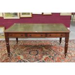 Early 20th century mahogany library table with green tooled leather inset moulded top over three