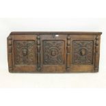 17th century carved oak frieze, having three relief scroll carved panels,