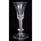 Georgian wine glass with drawn trumpet bowl on ball knop on air-twist inverted baluster stem on