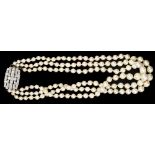 Cultured pearl triple stand necklace with three strings of cultured pearls graduating from 8.