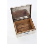 Contemporary Cartier silver cigarette box of rectangular form,