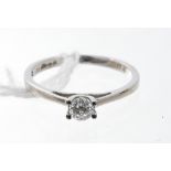 Diamond single stone ring, the round brilliant cut diamond weighing 0.