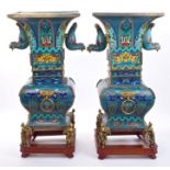 Fine and large pair of Chinese Qing period cloisonné archaich Gu vases finely decorated with taotie