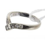 Diamond set 'wishbone' eternity-style ring.