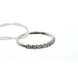 White gold (18ct) eternity ring with nine brilliant cut diamonds estimated to weigh approximately 0.