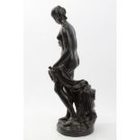 19th century Continental bronze figure of Venus with a dove, raised on naturalistic plinth base,