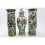 Late 19th century Chinese famille verte garniture of a pair of cylindrical vases and vase and cover,