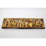 Chinese carved red and gilt lacquered panel,