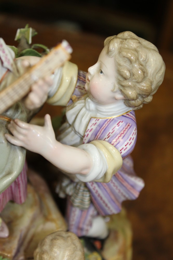 Large mid-19th century Meissen porcelain group of a musical family with putti and goat on rocky - Image 9 of 17