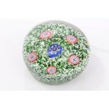 Mid-19th century French glass paperweight with pink and blue florettes on scrambled green and white