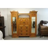 Victorian light oak and marquetry inlaid triple wardrobe,