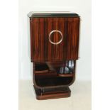 Fine Art Deco coromandel veneered and ebonised cocktail cabinet, with hinged top,