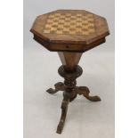 Victorian walnut and chess-top inlaid trumpet-work table,