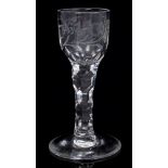 Fine Georgian wine glass with ogee bowl with engraved floral spray and bird,