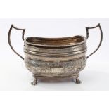 George III silver twin-handled sugar bowl of compressed baluster form,