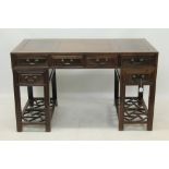 Chinese hardwood pedestal desk, having five drawers about the kneehole,