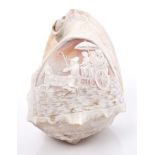 Fine 19th century carved conch shell cameo relief carved with a scene of figures in a horse-drawn