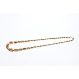 Yellow metal graduated ropetwist necklace,