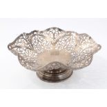Contemporary silver dish of hexagonal form, with pierced foliate decoration,