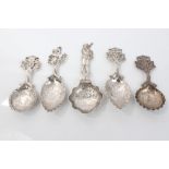 Collection of late 19th century Dutch silver spoons with embossed decoration - including three with