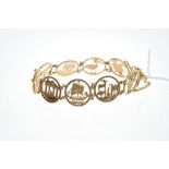 Gold (18ct) bracelet with nine pierced gold circular panels CONDITION REPORT Total