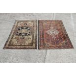 Persian rug with central petalled crown medallion within arabesque brick red ground and borders,
