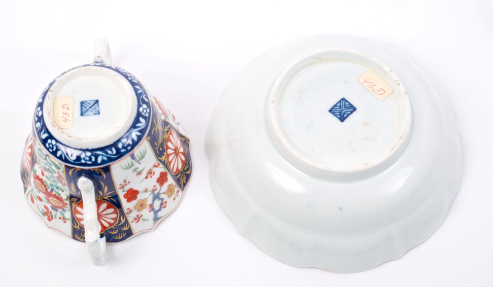 18th century Worcester Queens pattern two-handled chocolate cup and deep saucer with Kakiemon