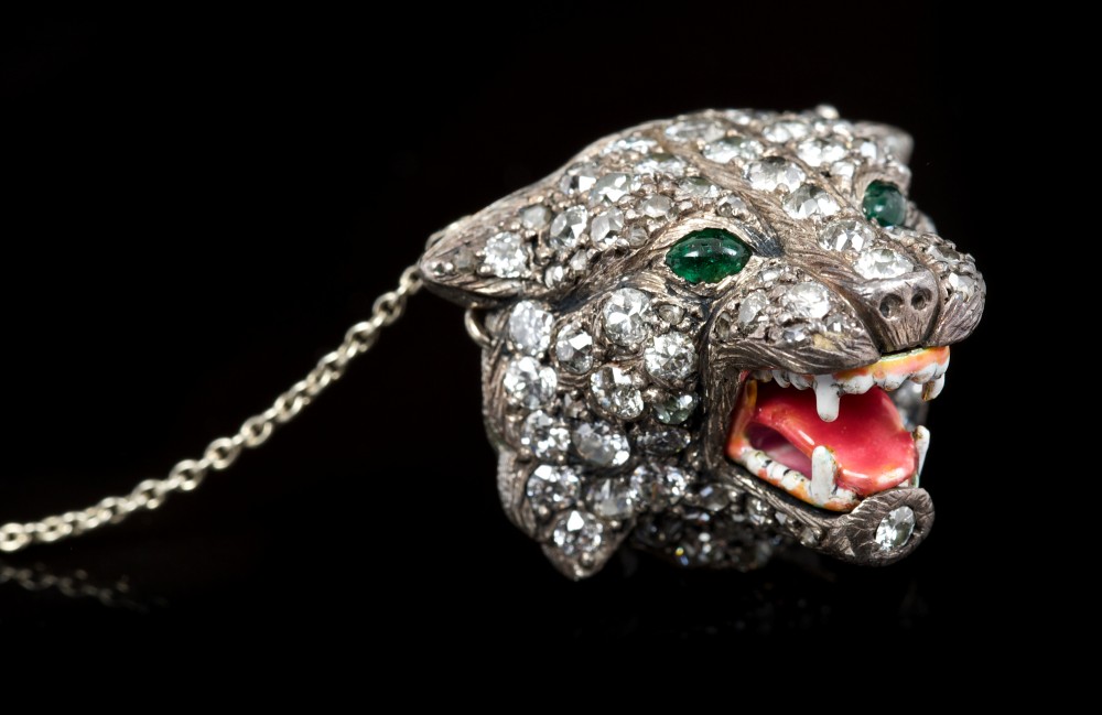 Unusual early 20th century diamond set tiger's head brooch,