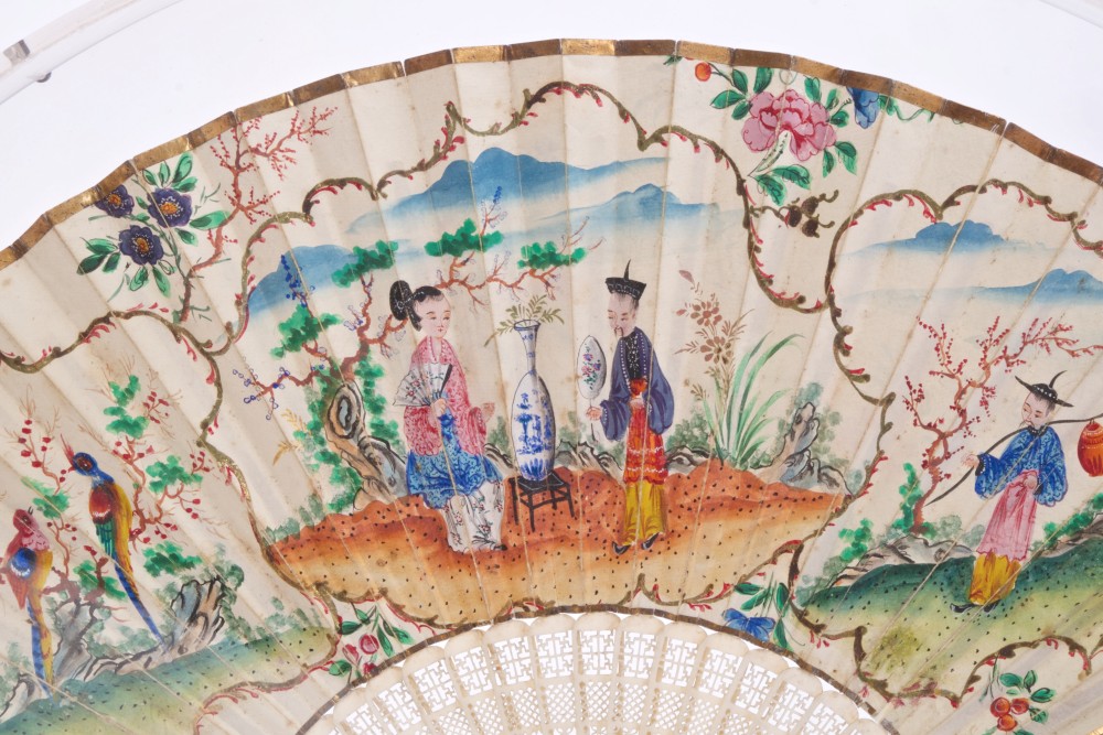 19th century carved Canton ivory and painted paper fan with finely lattice pierced sticks and - Image 2 of 3