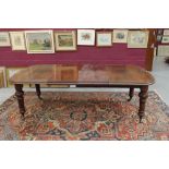 Victorian mahogany dining table, rounded rectangular top with moulded edge,