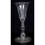 Georgian wine glass with bell-shaped bowl on triple knopped stem on folded foot, circa 1740, 15.