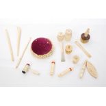 Collection of 19th century ivory and bone sewing accessories to include Japanese ivory pin cushion,