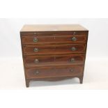 Regency mahogany and line inlaid chest of drawers with brushing slide and four graduated drawers on