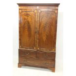 Good George III mahogany linen press with dentil moulded cornice above pair of roundel inlaid panel