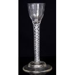 Georgian cordial glass with funnel bowl on double opaque twist stem on stepped conical foot,