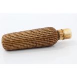19th century carved ivory scent bottle of cylindrical tapering form, bound with wicker work,
