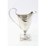 George III silver helmet-shape cream jug with spot-punched border,