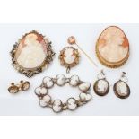 Three Italian carved shell cameo brooches, carved shell cameo panel bracelet,