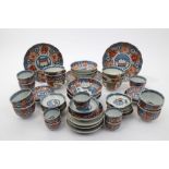 Late 19th century Japanese Imari porcelain dinnerware - comprising bowls,