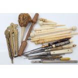 Collection of 19th century and earlier bodkins in a variety of materials - including bone, ivory,