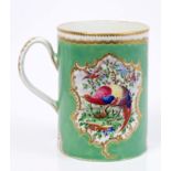18th century Worcester cylindrical mug with polychrome painted exotic bird reserves on pale green