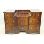 Highly unusual late 18th century / early 19th century mahogany estate desk of serpentine outline,