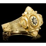 Victorian Etruscan-revival hinged bangle,
